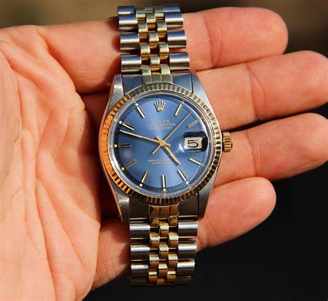 rolex silver with blue dial